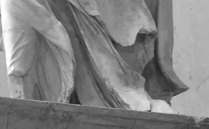 The foot of the Winged Victory touching the prow
