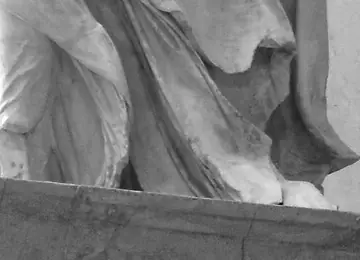 The foot of the Winged Victory touching the prow